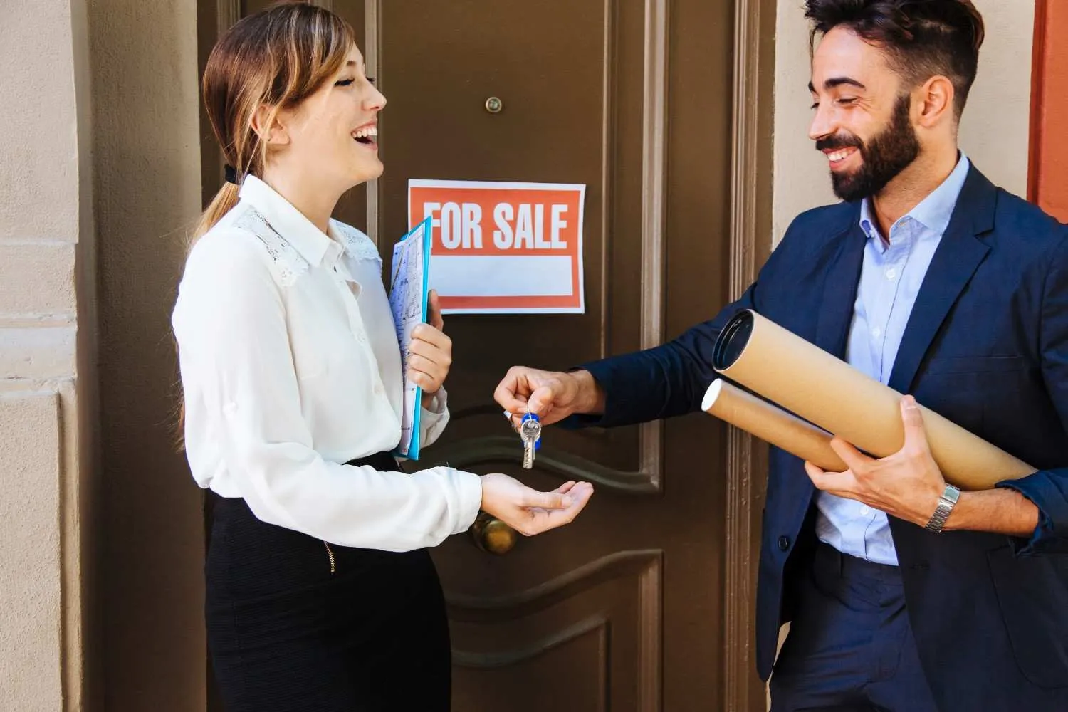 A homeowner reviewing closing documents at a table